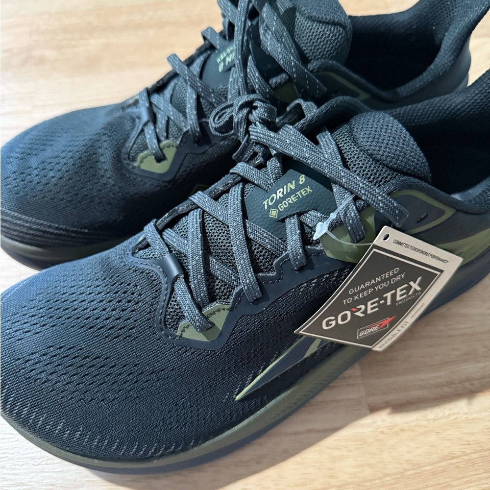 Altra Black and Green Athletic Shoes with Mesh Upper and Cushioned Midsole.